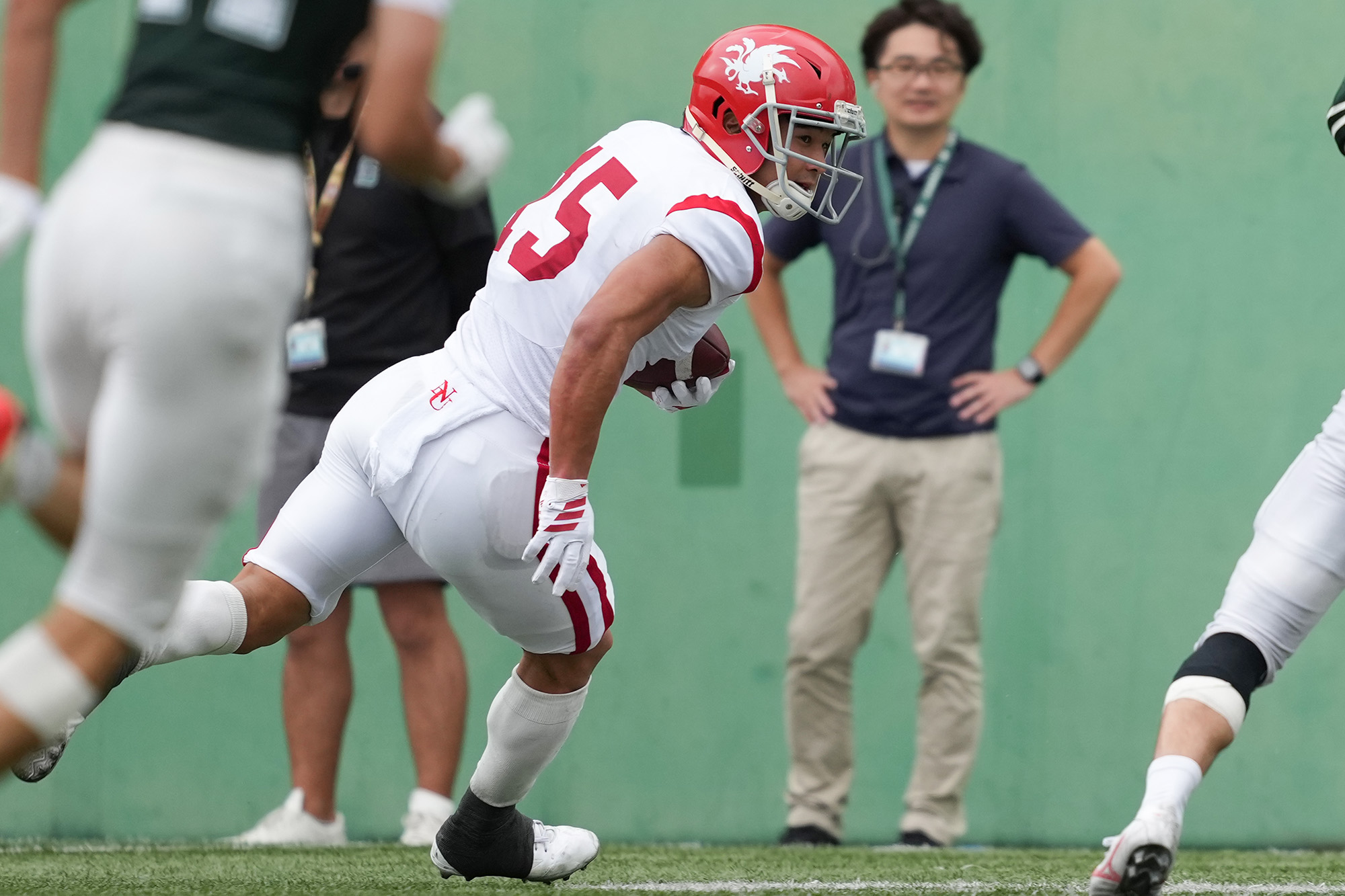 キャッチ後の走りで距離を稼いだ冨士原優斗=撮影：北川直樹