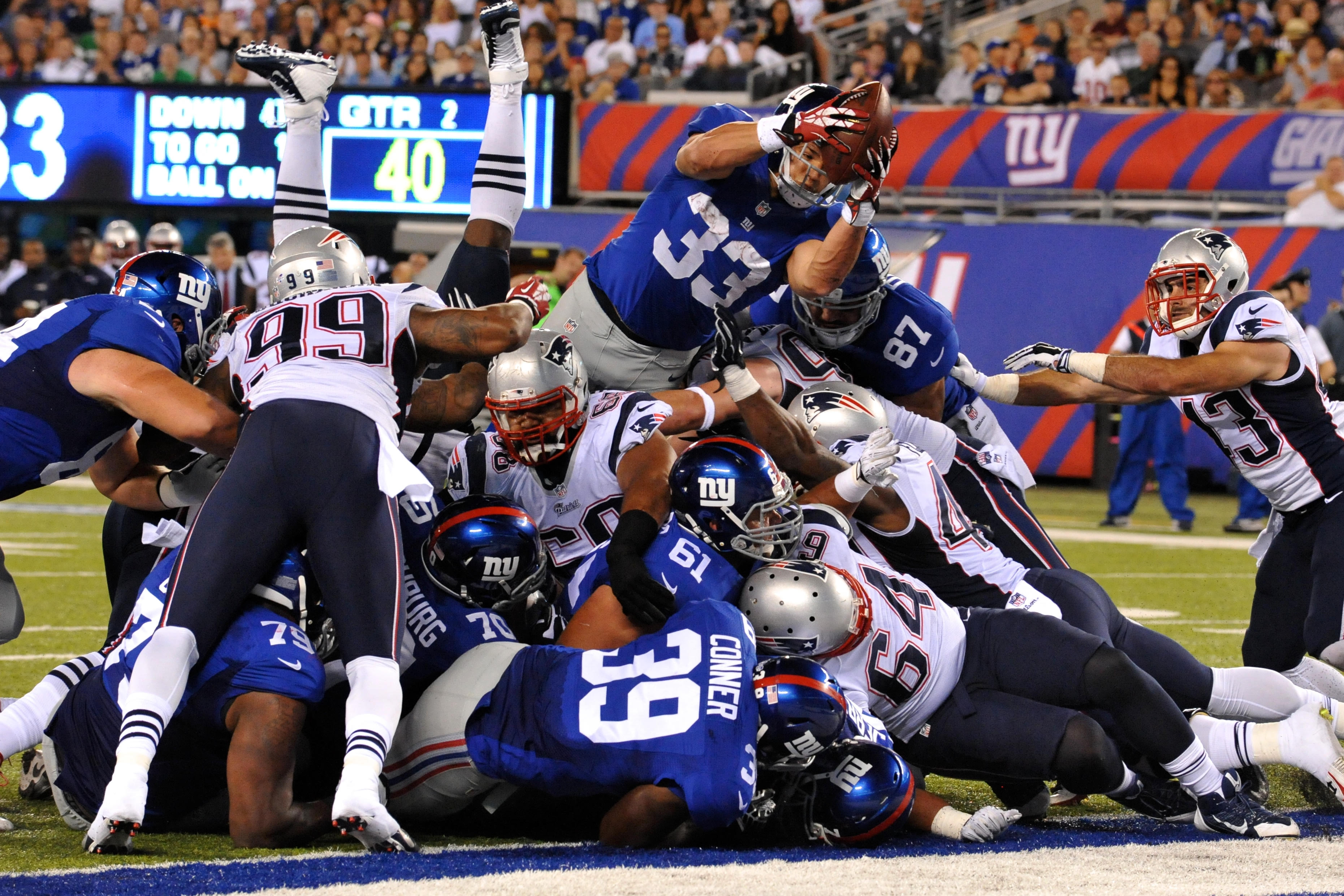 2014年8月のジャイアンツvsペイトリオッツ戦でタック牧田さん撮影。プレシーズン戦でのベストショットという牧田さんは2014年シーズンに向け手ごたえを感じていた。